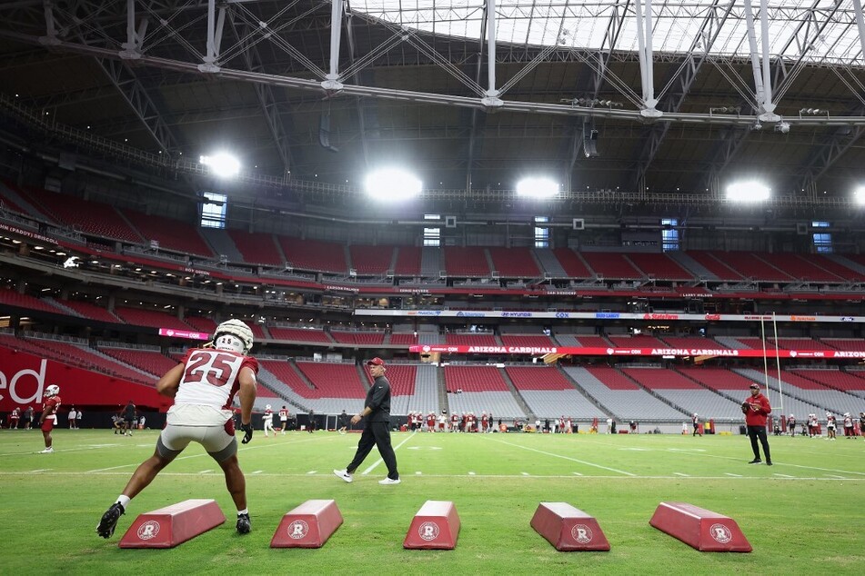 Linebacker Zaven Collins of the Arizona Cardinals participants in a team training camp at State Farm Stadium in Glendale, Arizona.