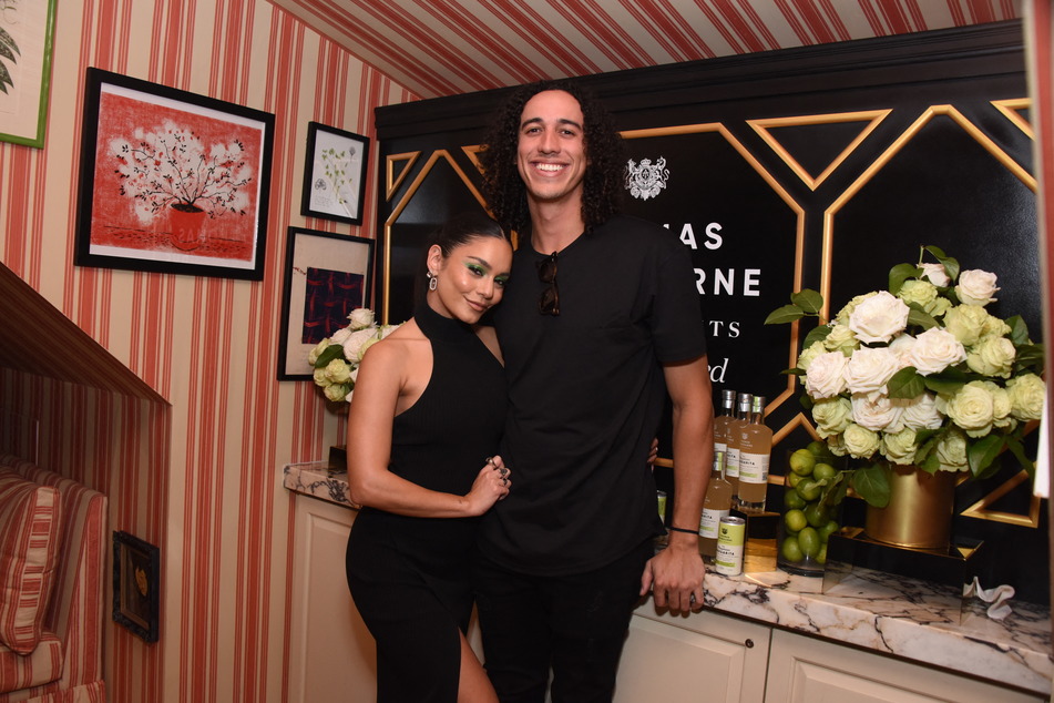 Vanessa Hudgens and Cole Tucker at the Thomas Ashbourne Margalicious Margarita Dinner on October 08, 2022 in West Hollywood, California.