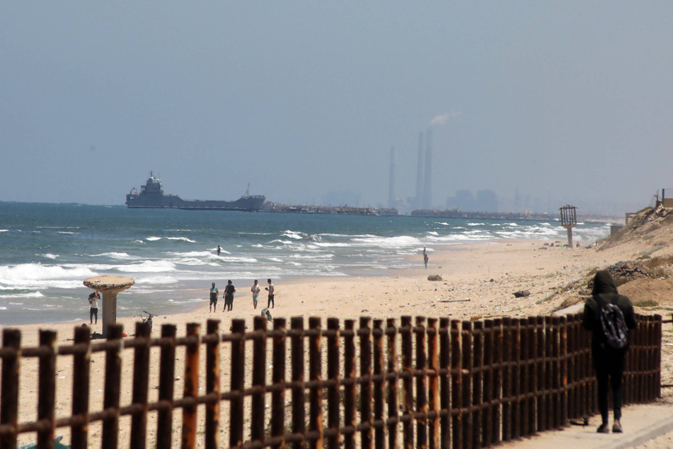 United States Navy ships anchor off the coast of Gaza to operate for floating humanitarian aid pier project.