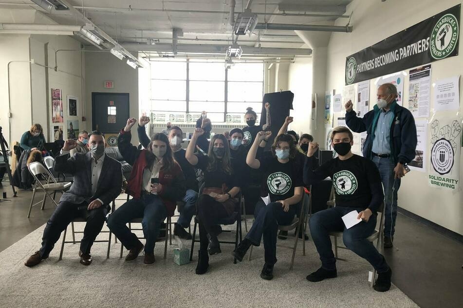 Starbucks Workers United organizers in Buffalo gather together to watch their union election vote count in December 2021.