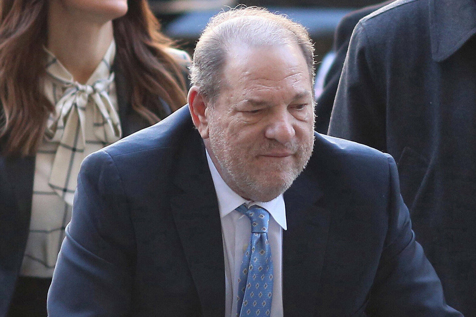 Harvey Weinstein arriving at the Manhattan Criminal Court with his attorneys on February 24, 2020.