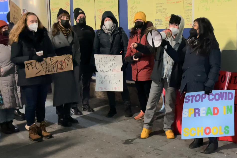 Youth activist Theo Demel (second from r.) spoke at a rally on Monday to mobilize the NYC walkout and call for more Covid-19 precautions in school.