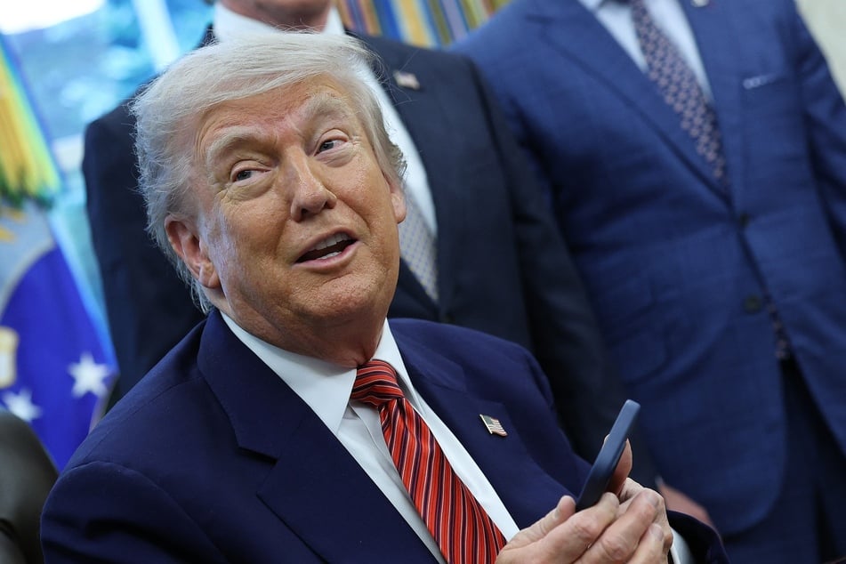 President Donald Trump speaks after signing executive orders in the Oval Office of the White House on Friday in Washington, DC.