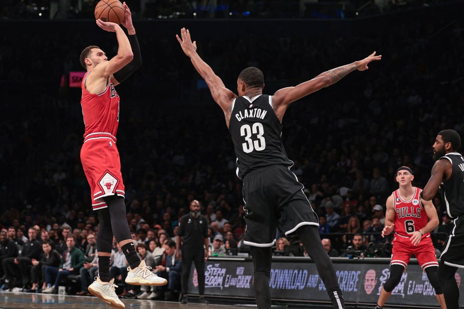 Chicago Bulls guard Zach LaVine shoots the ball over Brooklyn Nets forward Nic Claxton during the second half at Barclays Center.