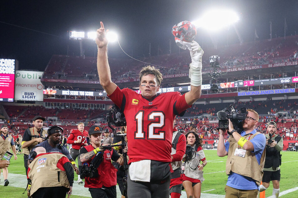 Tampa Bay Buccaneers quarterback Tom Brady celebrates after beating the New Orleans Saints at Raymond James Stadium.