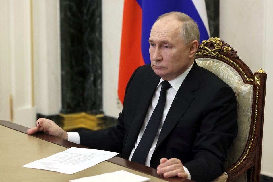 Russia's President Vladimir Putin holds a meeting addressing measures taken after the Friday Moscow attack via a video conference on Monday.