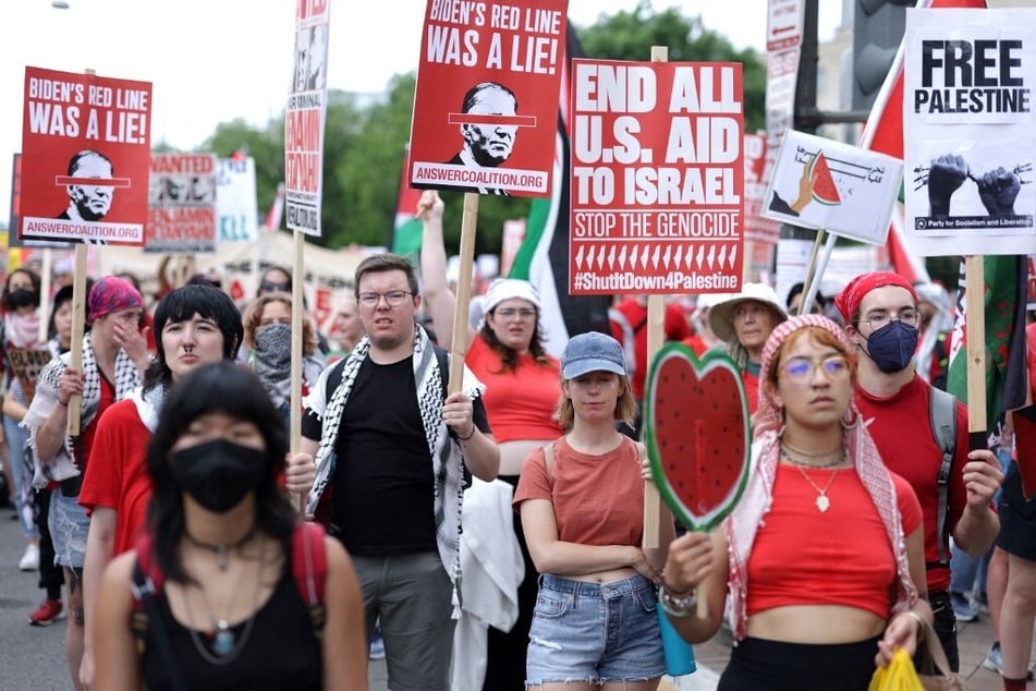 Activists stage a march and rally for Palestinian freedom near the US Capitol in Washington DC.