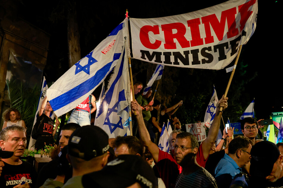 Protesters in Jerusalem wore shirts bearing slogans including "Stop the war" and "We are all created equal" as they demanded a full hostage return.