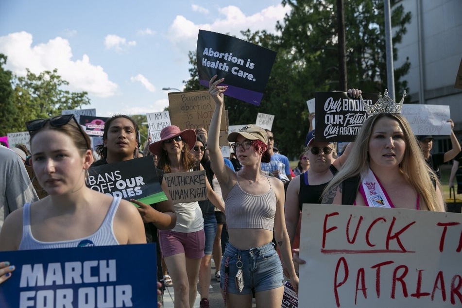 Protesters in North Carolina march for abortion rights following the Supreme Court's decision to overturn Roe v. Wade.