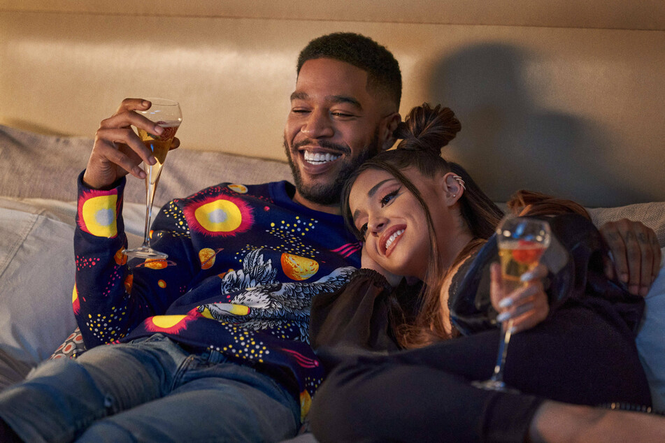Kid Cudi (l.) and Ariana Grande play a pop star couple in Don't Look Up.
