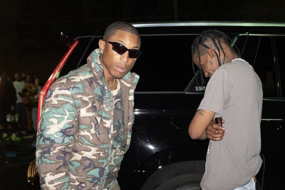 Pharrell Williams (l) and Travis Scott are dropping a new collab on Friday.