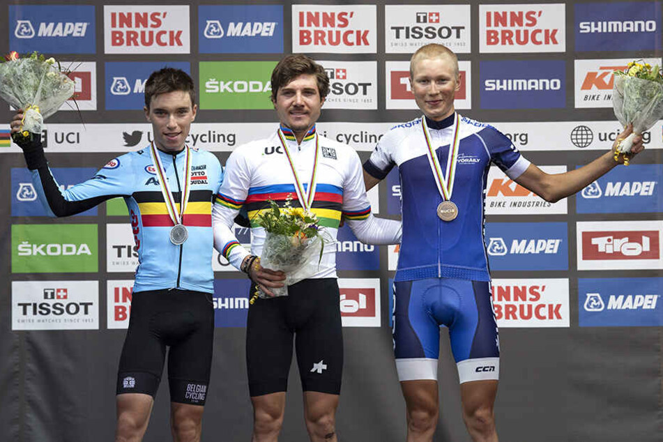 2018 wurde Bjorg Lambrecht (li.) bei der U23-Radsport-Weltmeisterschaft in Österreich Zweiter, Gold holte Marc Hirschi (Mi.) aus der Schweiz, Jaakko Hanninnen (re.) aus Finnland wurde Dritter.