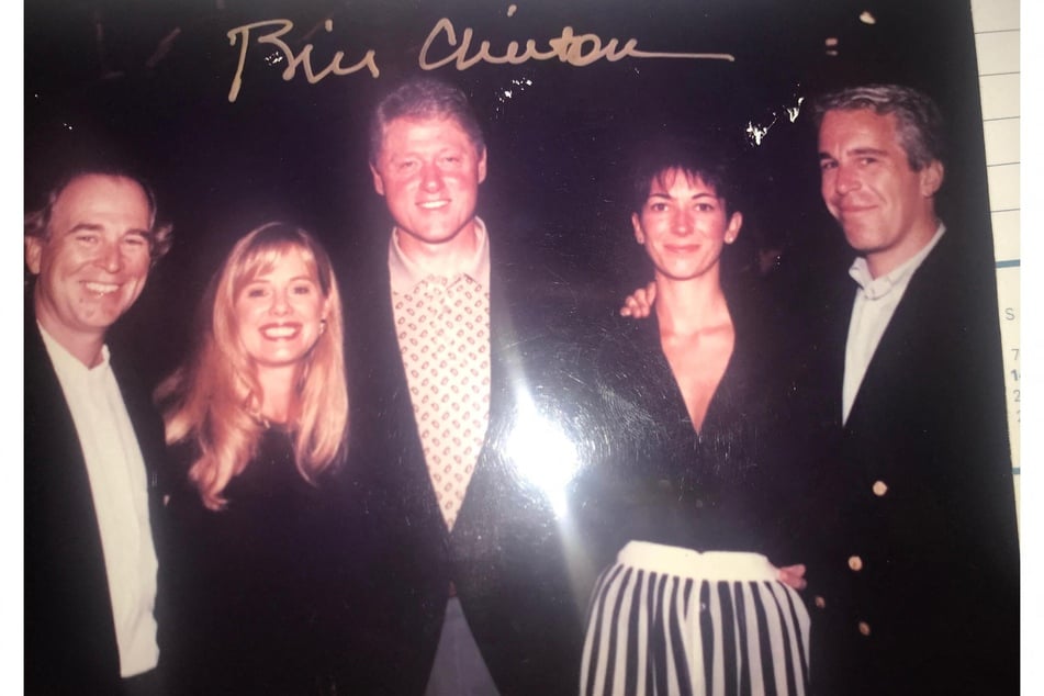 This undated photo from the personal collection of Jeffrey Epstein provided by the Democrats on the House Oversight Committee on December 12, 2025, shows former President Bill Clinton (c.) posing with Epstein (r.) and Ghislaine Maxwell (second from r.).