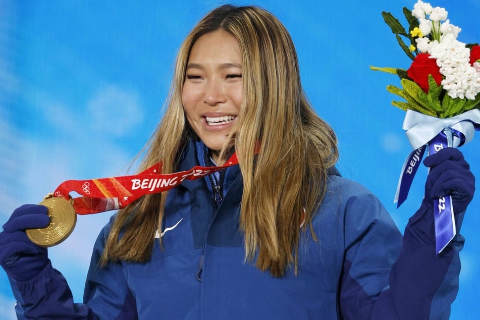 Chloe Kim of the United States during the medal ceremony for the women's snowboard halfpipe at the Beijing Winter Olympics.
