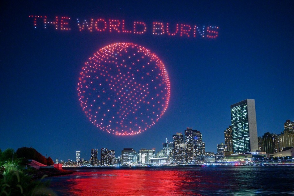 A light display created using drones is performed before the New York City skyline and United Nations headquarters as part of a campaign to raise awareness about the Amazon rainforest and the global climate crisis ahead of the 78th United Nations General Assembly and Climate Ambition Summit.