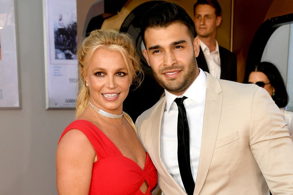 Sam Asghari (r.) gave more insight into his romance with Britney Spears in a new interview.