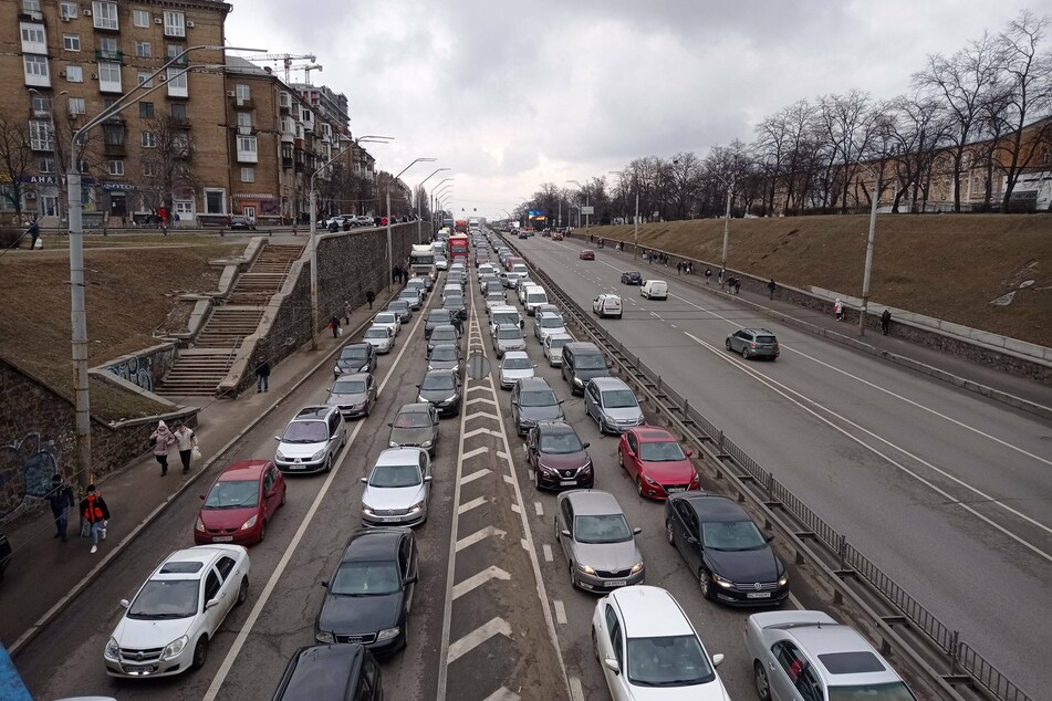 Vehicles lined up in backed up traffic to leave Kyiv, Ukraine on Thursday.