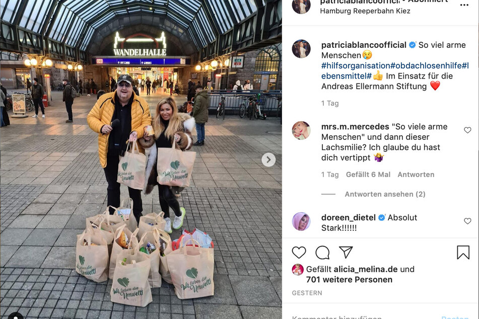 Patricia Blanco (49) und Andreas Ellermann verteilen Tüten an Obdachlose.