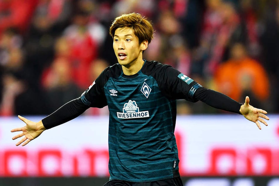 Da staunt Yuya Osako nicht schlecht: Der SV Werder Bremen legt eine Million Euro für polizeiliche Mehrkosten zurück.