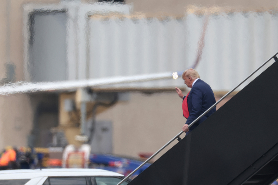 Donald Trump arrives at Reagan National Airport.