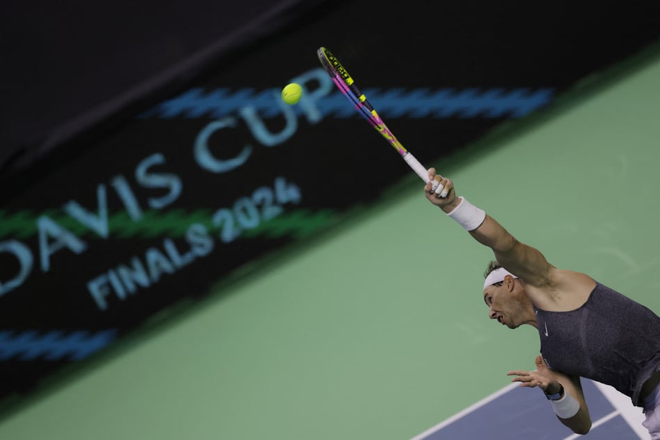 Rafael Nadal hits the ball during a practice session at Martin Carpena arena.