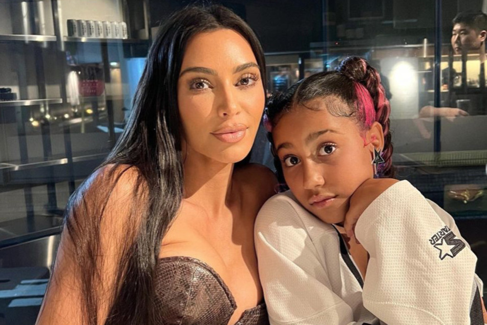 Kim Kardashian's daughter North West (r) dished on her fashion and her future in her first solo interview.