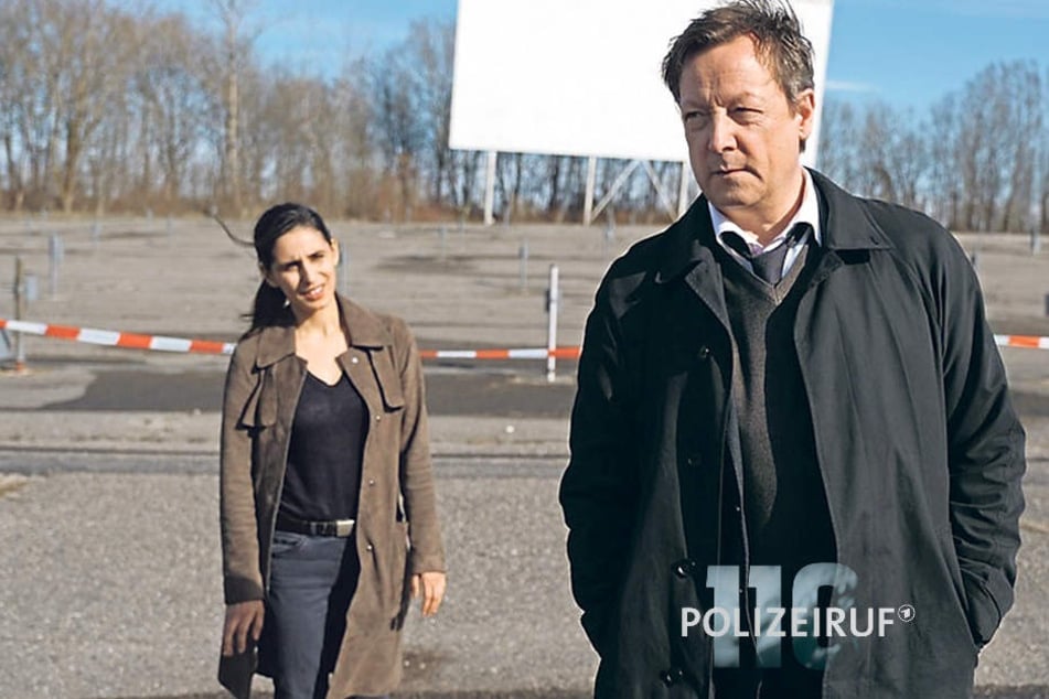 Hanns von Meuffels und Nadja Micoud treffen sich am Tatort - dem Parkplatz eines Autokinos.