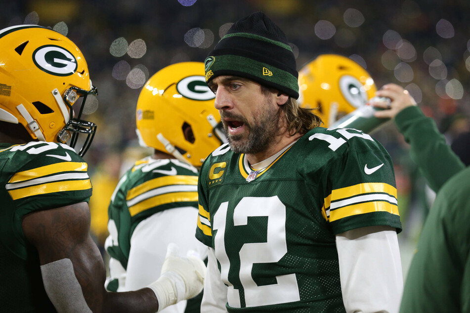 quarterback Aaron Rodgers (c) has been nursing an injured toe over the last three games during this season.