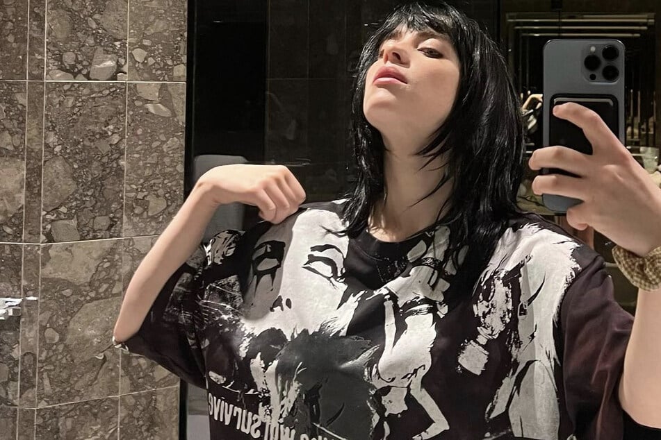 Billie Eilish repping an oversized t-shirt.