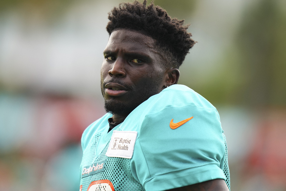 Tyreek Hill #10 of the Miami Dolphins looks on during training camp practice with the Atlanta Falcons on August 07, 2024 in Miami Gardens, Florida.