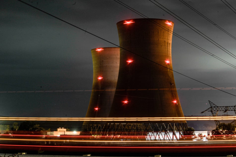 The Three Mile Island Nuclear Plant is seen on Saturday from across the river in Etters, Pennsylvania. Microsoft and Constellation Energy reached a deal that would restart Unit 1 of the Three Mile Island Nuclear plant, which was previously retired in 2019.