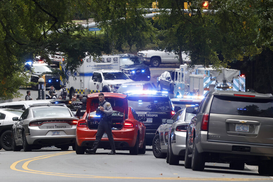 Police and emergency services at the scene of the shooting that led to a lockdown of the University of North Carolina at Chapel Hill.