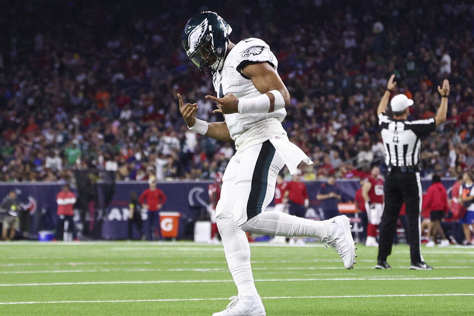 Philadelphia Eagles quarterback Jalen Hurts reacts after a successful two-point conversion after a touchdown in the fourth quarter against the Houston Texans at NRG Stadium.