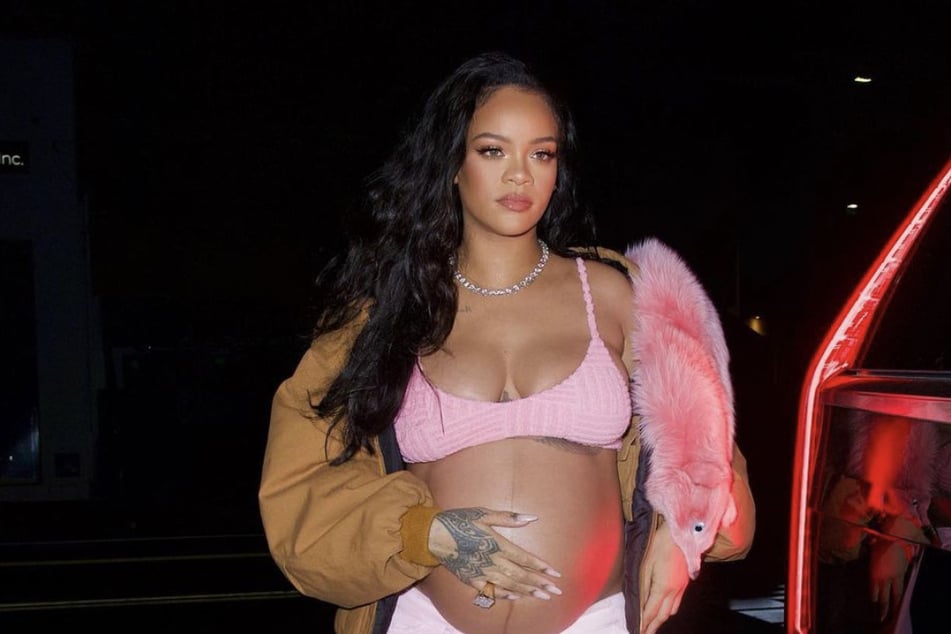 Rihanna explains why she's sticking to her own maternity style and her surprising pregnancy in her recent Vogue cover.