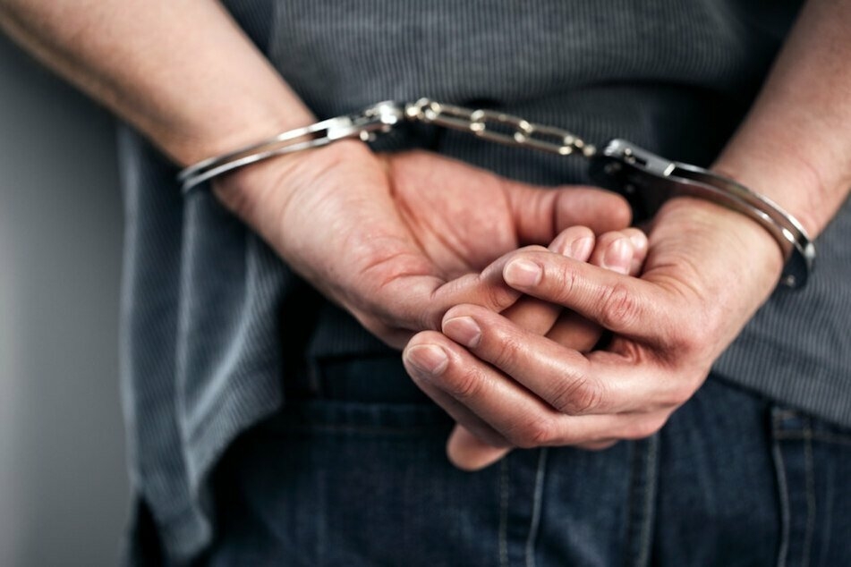 Instead of handcuffs, Carl Wallace thinks offenders should get a chance to start a new life (stock image).