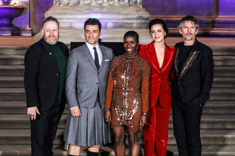 From l. to r.: David Ganly, Oscar Isaac, Ann Akinjirin, May Calamawy, and Ethan Hawke attend the UK premiere of Moon Knight at the British Museum in London.