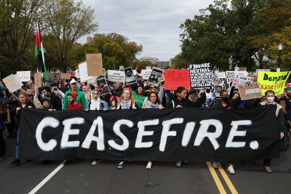 Protesters march past the US Capitol building calling for a ceasefire in Gaza.