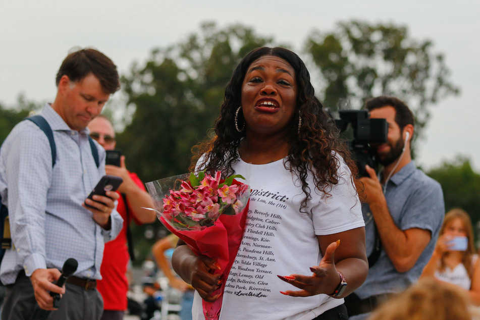 Missouri Rep. Cori Bush breaks into tears after the White House extended the eviction moratorium earlier in August.
