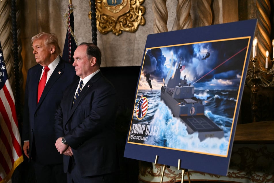 President Donald Trump (l.) and Navy Secretary John Phelan (r.) look on after the announcement of the US Navy’s new Golden Fleet initiative, unveiling a new class of warships, at Mar-a-Lago in Palm Beach, Florida, on December 22, 2025.