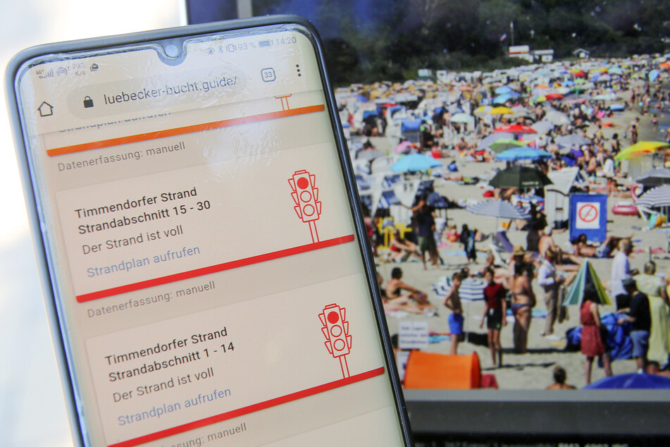 Die Strandampel auf einer Website leuchtet rot - der Strandabschnitt ist voll.