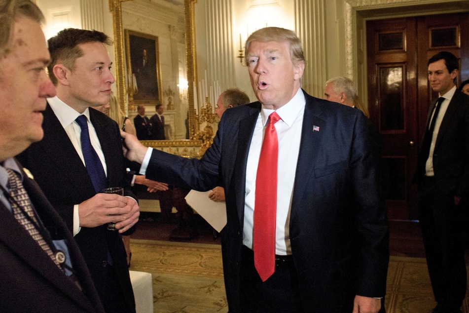 Donald Trump (r.) greeting Elon Musk (l.) before a policy and strategy forum at the White House on February 3, 2017.