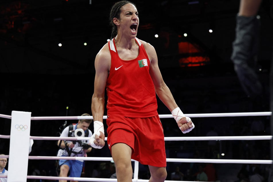 Imane Khelif of Algeria celebrates after winning her fight against Anna Luca Hamori of Hungary at the Paris Olympics.