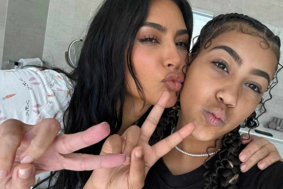 Kim Kardashian just told an interviewer about how her daughter North "forces" her to do "ridiculous dances" on TikTok!