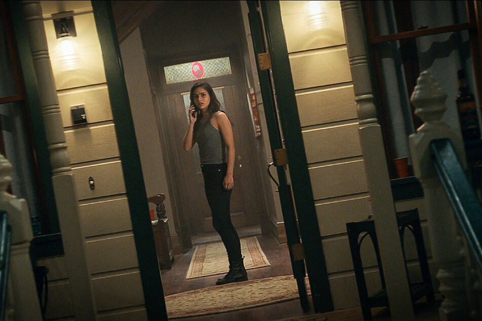 Melissa Barrera plays Amber Carpenter - a Woodsboro native who harbors a dark secret - and returns to face Ghostface.