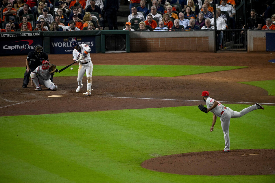 Philadelphia Phillies relief pitcher Seranthony Dominguez pitches to Houston Astros first baseman Yuli Gurriel during Game 1 of the 2022 World Series at Minute Maid Park.