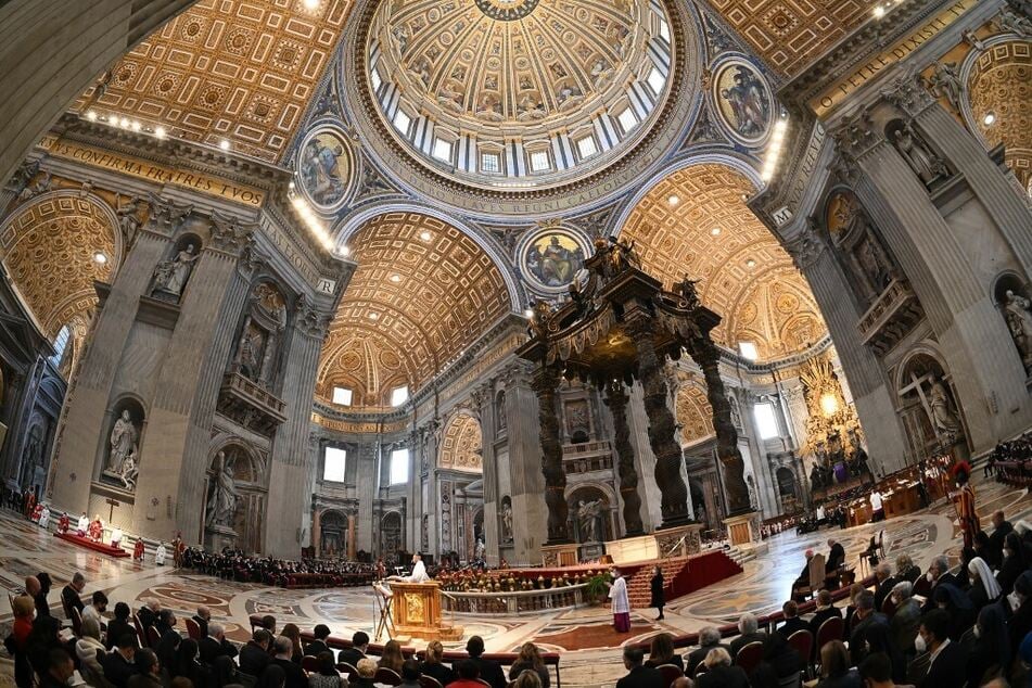 Pope Francis presides over the Liturgy of the Lord's Passion in St. Peter's Basilica on Good Friday 2022.