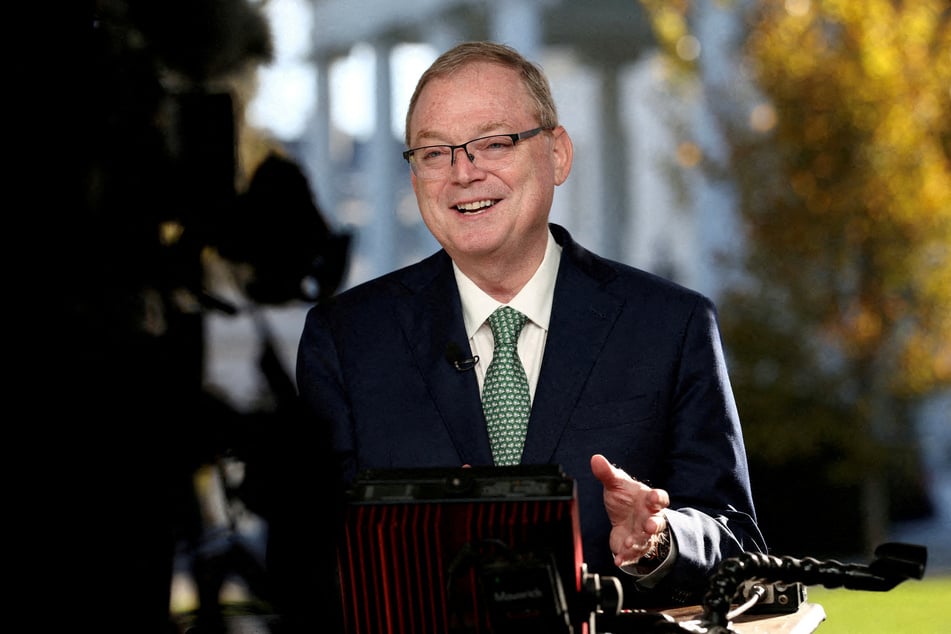 President Donald Trump's economic adviser Kevin Hassett speaks in front of a TV camera at the White House in Washington DC on November 13, 2025.