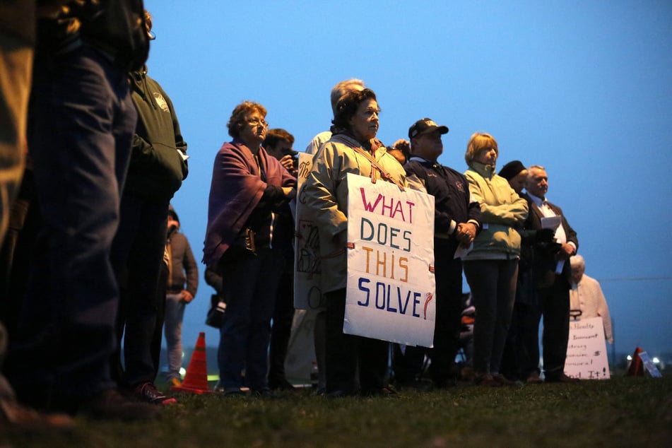People opposing the death penalty gather outside the Florida State Prison in Raiford.