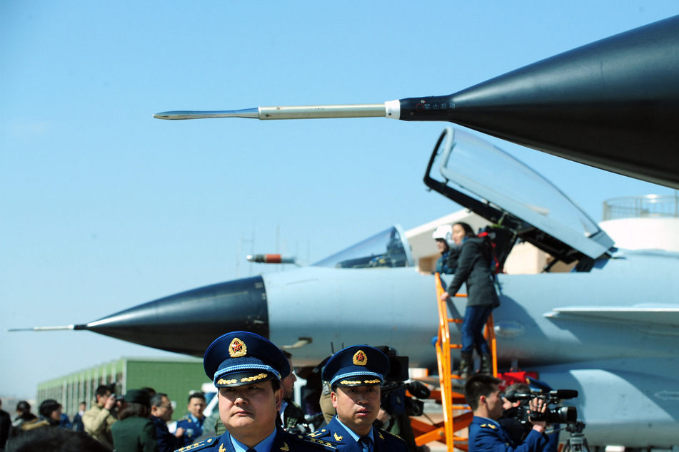 Chinese jets circle Taiwan as intimidating military drills continue