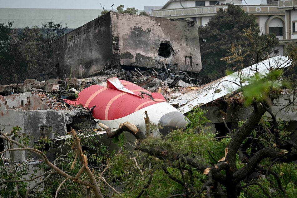 Debris of Air India flight 171 is pictured after it crashed in a residential area near the airport in Ahmedabad on Friday.